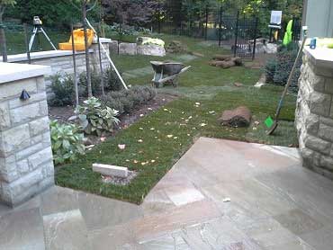 Landscape construction photo of the lawn and patio